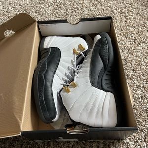 Jordan Taxi 12s size 7Y. Worn once. Comes with original box